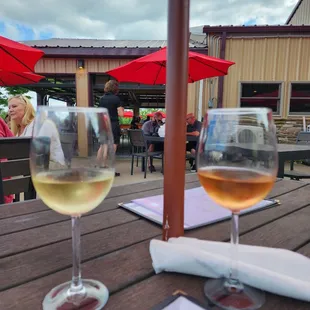 two glasses of wine on a table