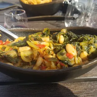 Beans and Greens minus the sausage and cheese =Vegan. Spicy and super filling. I had half for lunch the next day.  :)