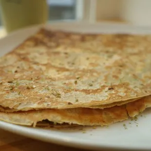 a stack of flatbreads on a plate