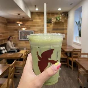 Iced matcha latte with oat milk