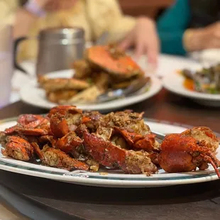 a plate of crab legs on a table