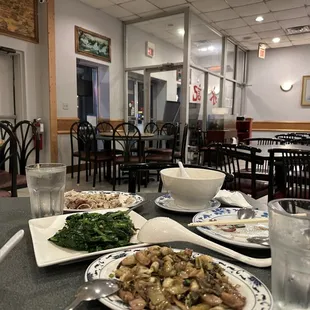 Restaurant inside. Duck tongue snow pea sprouts rice noodles