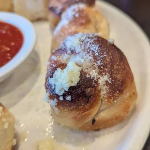 Each knot had tons of garlic flavor, perfectly buttery, bit of parm cheese, moist and doughy inside.