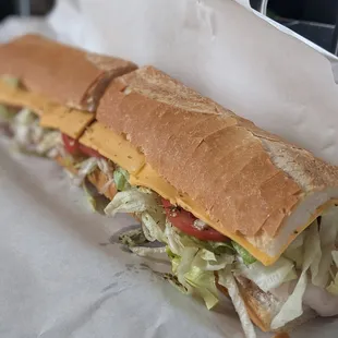 Turkey and cheese sandwich with everything.