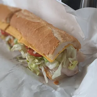 Turkey and cheese sandwich with everything.