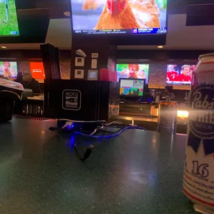 a can of beer and a television