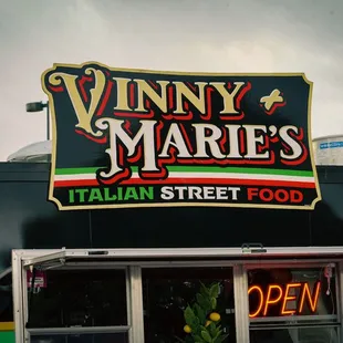 a sign for vinny marie&apos;s italian street food