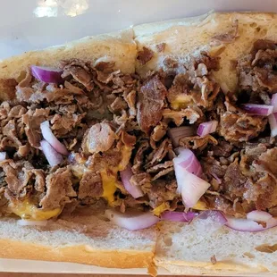 Cheesesteak with raw onions and mayo