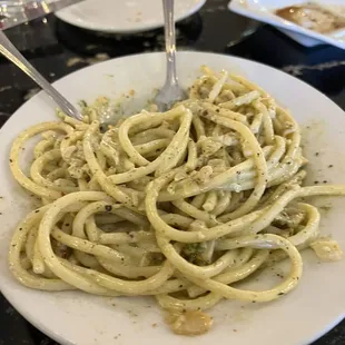 Clams and NOT linguine. Not bad. Interesting fat pasta though. Needs more garlic.