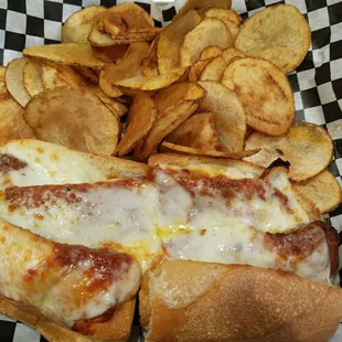 a cheesy hot dog and chips