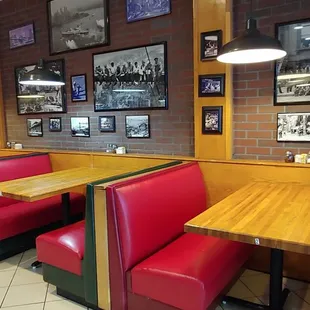a row of booths and tables