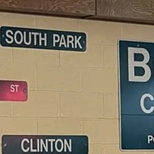 a wall of street signs