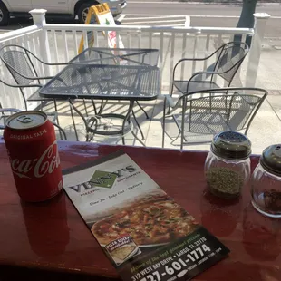 Indoor out door seating plus 3 -2 top tables inside