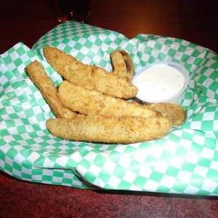 Fried pickles with dipping sauce.