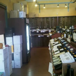 bottles of wine on display in a wine shop