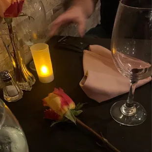 Waiter gave me a rose at the end of our meal.