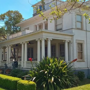 a man taking a picture of a house