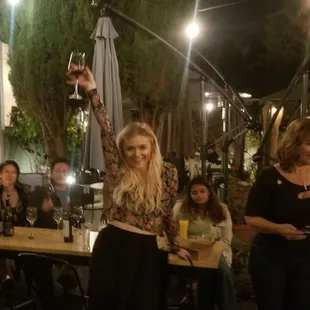 A gathering of friends in the patio area.