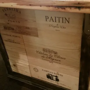 Bar for tasting made from wooden boxes for shipping wine.