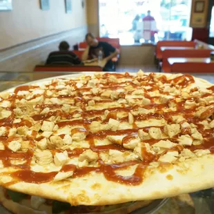 Vino's has a BBQ chicken pizza that is delicious!