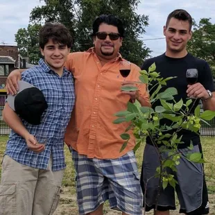 My nephews and I with the ceremonial toast of planting this future 20 foot ash tree