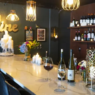 bottles of wine on a bar