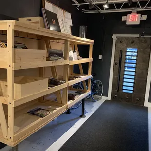 a room with shelves and a bicycle