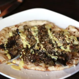 Baba Ghanoush ($13) - roasted eggplant, curried yogurt, almond, fennel, golden raisin, flatbread