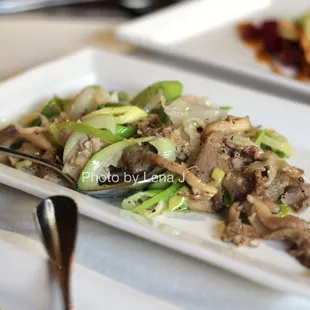 Oyster Mushroom ($15) - blue, yellow, and black leeks