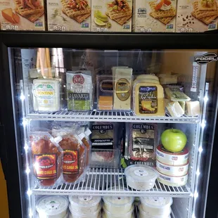 We carry home made dips and spreads, packaged cheeses and specialty meats