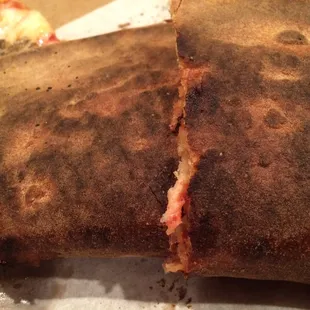 Burnt take-out. Manager argued with me over the phone about it even being possible! Bye bye Vino&apos;s!