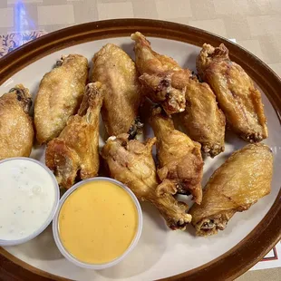 Wings with Cajun Ranch in the side.