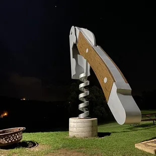 a sculpture of a corkscrew