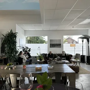 a dining room with tables and chairs