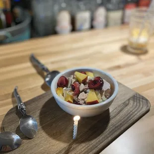Complimentary birthday dessert - homemade meringue &amp; fruit bowl