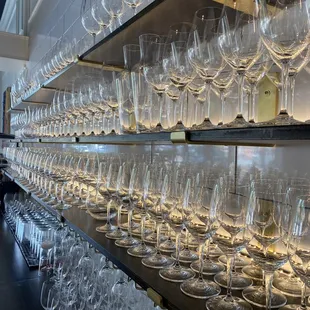 rows of empty wine glasses