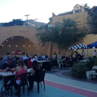 a crowd of people sitting at tables