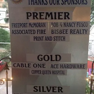 a sign for the bisbee rotary club