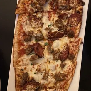 Sausage &amp; Pepperoni Flatbread - Tomato sauce with mozzarella, sausage, &amp; grilled pepperoni.