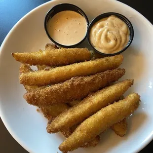 Fried Pickles - Breaded pickle spears. Served with Cajun aioli &amp; Sriracha ranch.