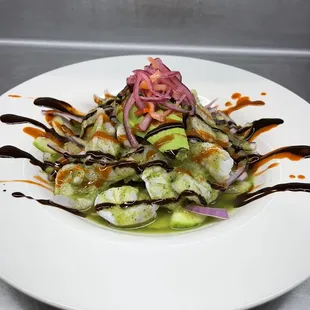 This Aguachile is on the mild side. It is so Delicious.This is the place to visit while on Galveston Island! Hope to See you soon.