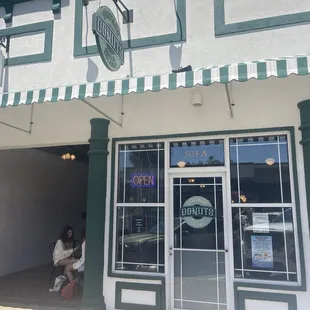 Front door and outside seating.