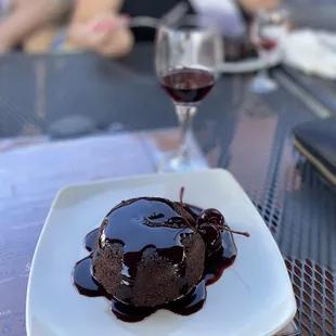 Chocolate lava cake. No hot chocolate in the center, but there is plenty on top of the cake! I paired this with the raspberry dessert wine!