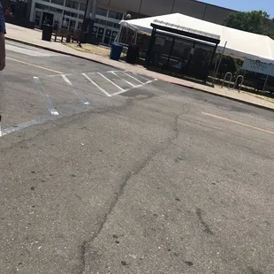 Walking up to back entrance from top parking lot area