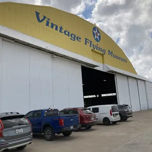 One of the two hangars with parking in front