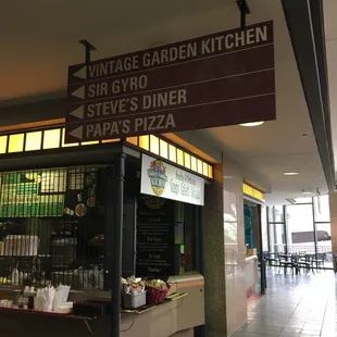 A bit hard to find. Is a small to go place. Seating is available as part of the four court.