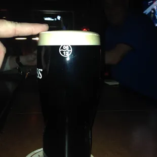 Craig pours a perfect Guiness.