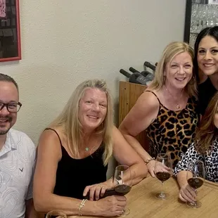 a group of people sitting at a table