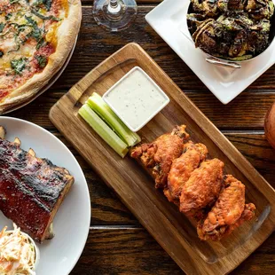 a variety of food on a wooden table