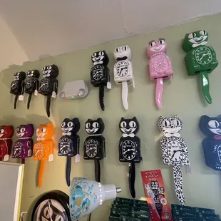 A collection of Kit Kat clocks for sale at vintage vibe.